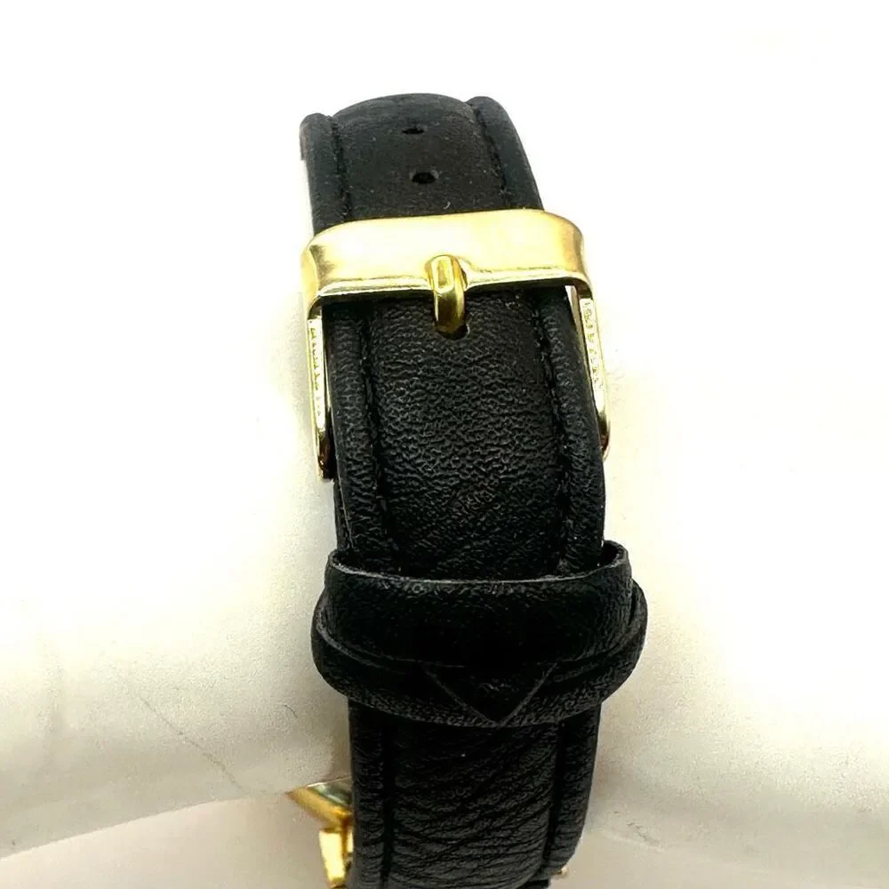 Embassy gold tone rhinestone watch